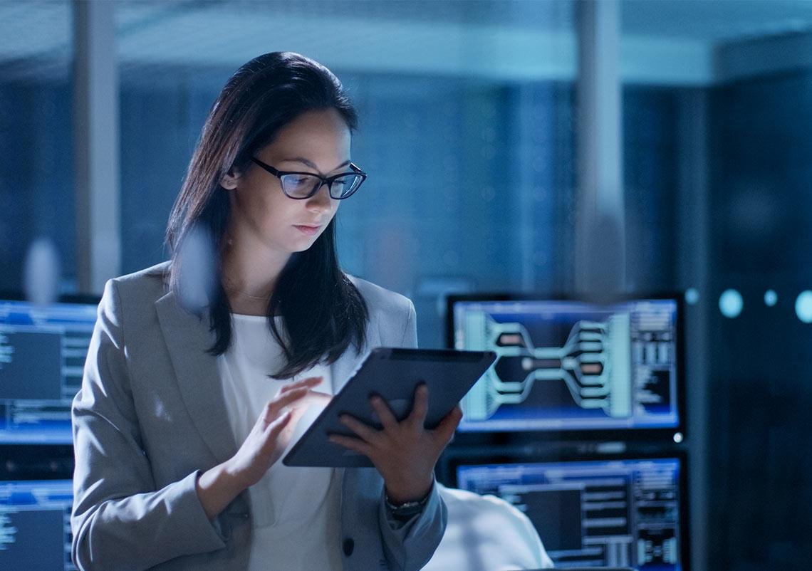 Woman Working on Tablet